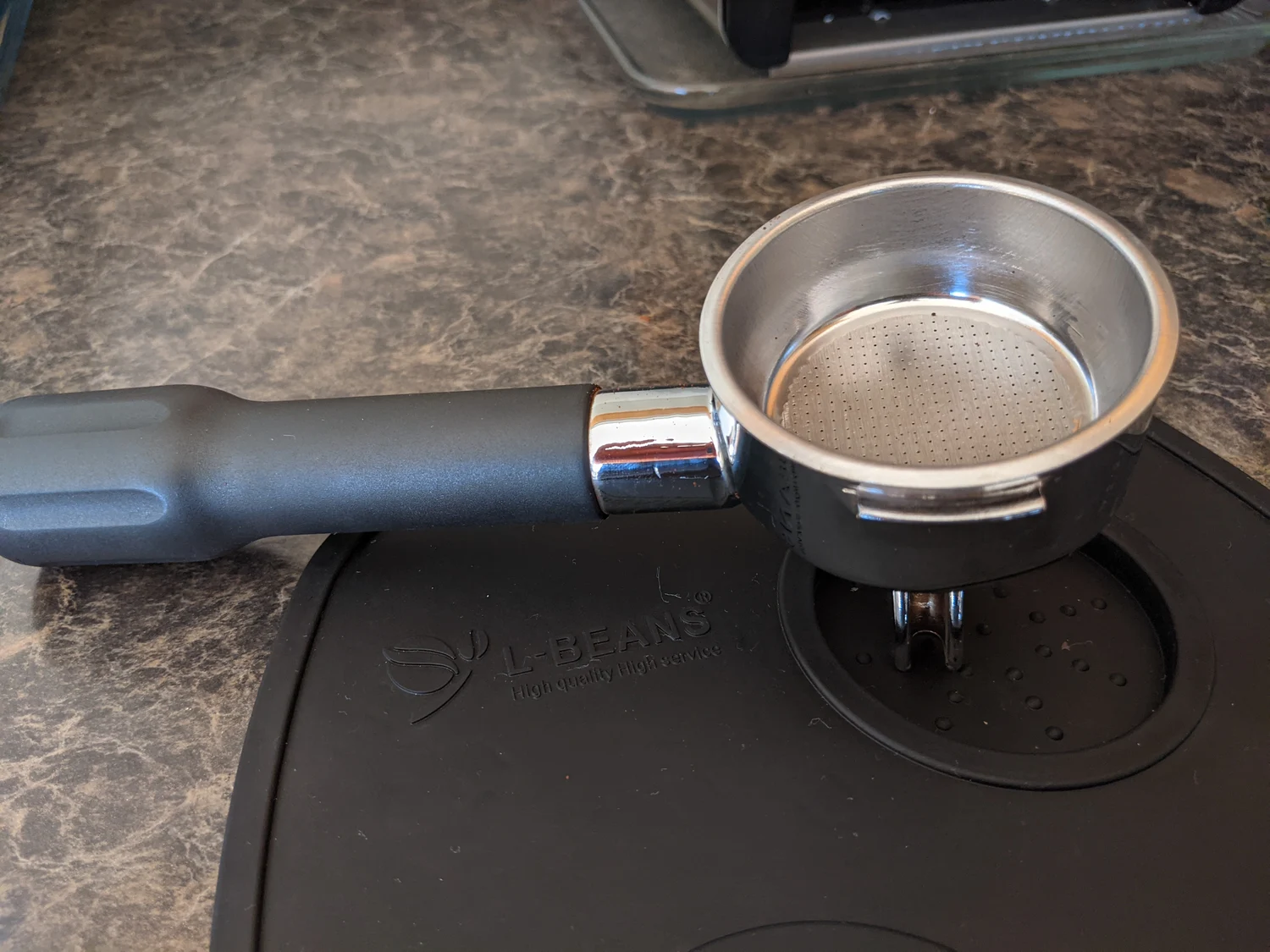 Freshly ground coffee in an espresso portafilter