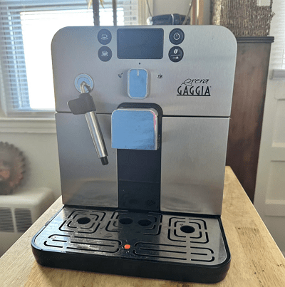 Gaggia Brera compact superautomatic with stainless Pannarello wand and front-access tank.