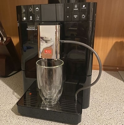 Melitta Passione OT compact bean-to-cup espresso machine with milk system.