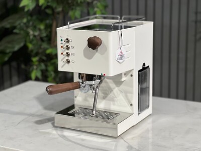 Quick Mill Pippa 4100 single-boiler espresso machine with brass boiler and front gauge.