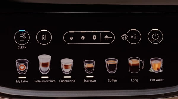 De’Longhi Magnifica Evo control panel showing drink buttons for latte, cappuccino, espresso, coffee, and hot water